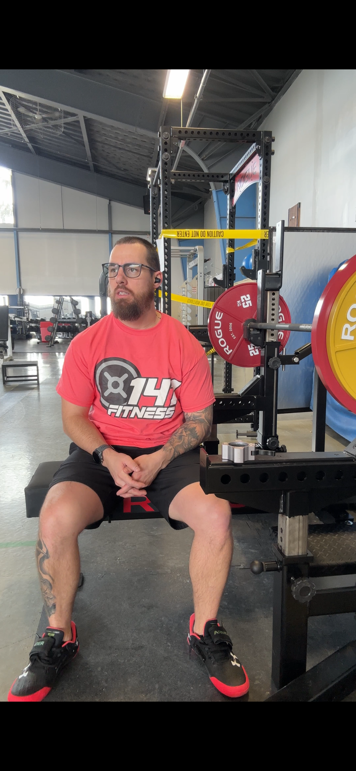 Personal trainer coaching a client